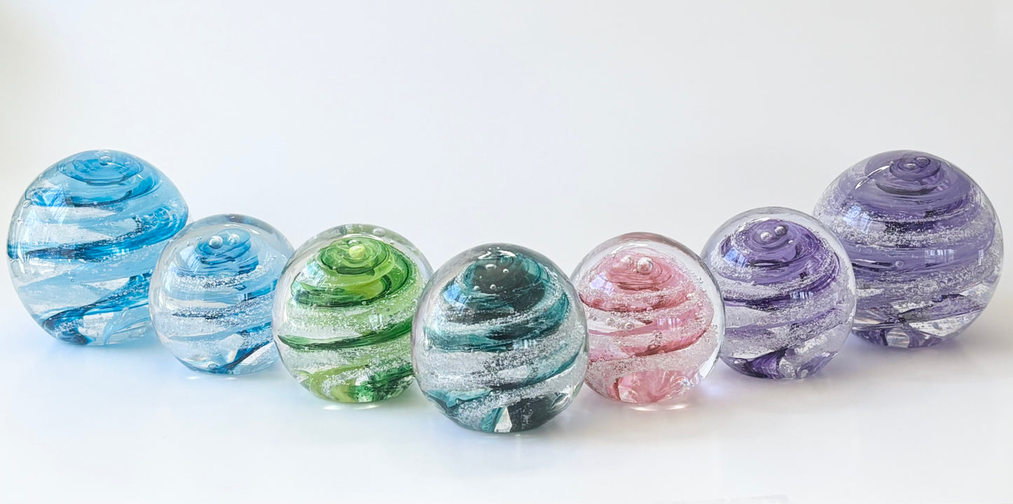 Petite remembrance orb handcrafted in your choice of colored glass with ashes suspended inside