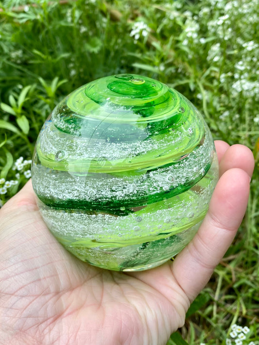 hand made glass memorial paperweight in transparent and opaque greens