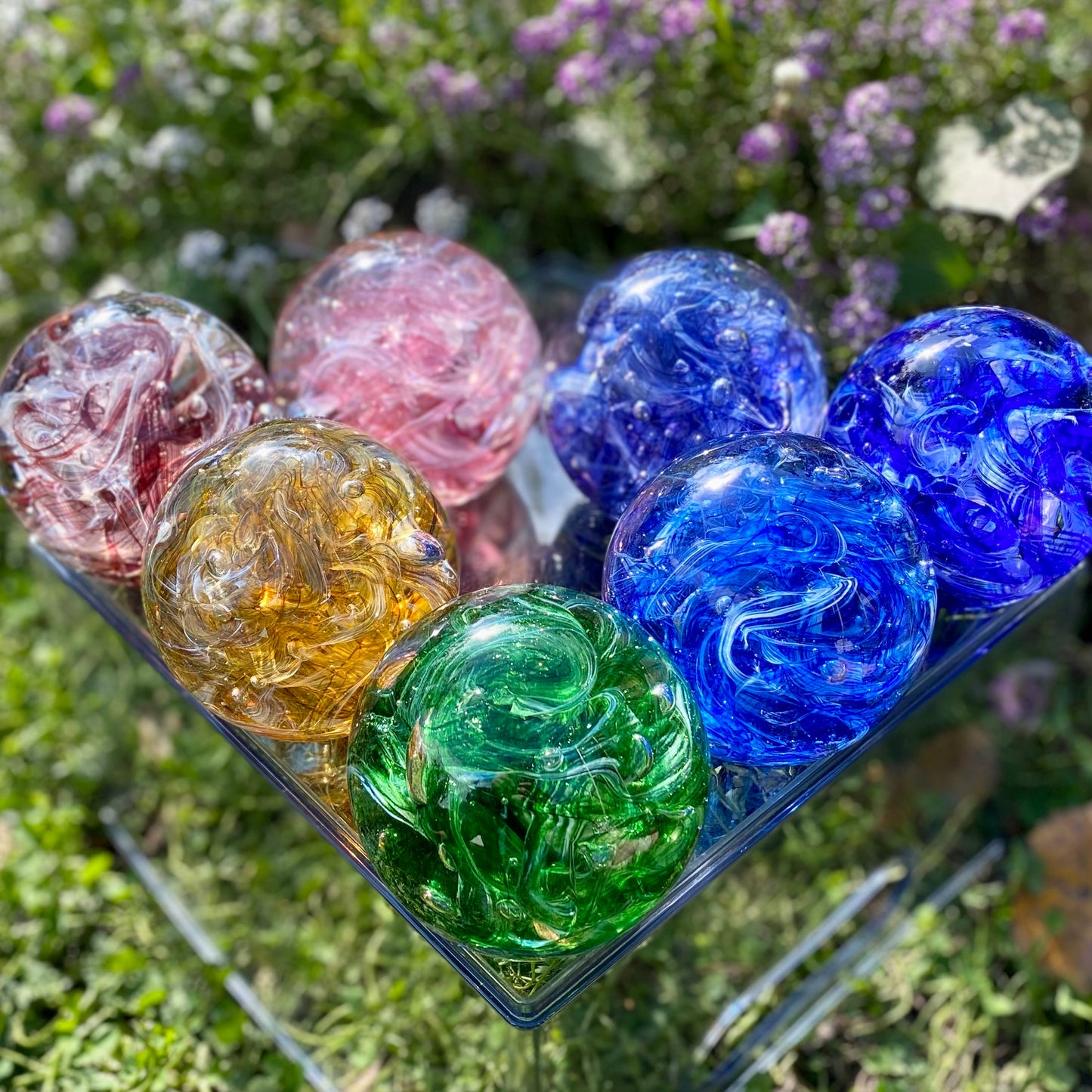 Handblown glass memorial featuring our ribbon twist memorials in your custom colors
Glass memorial, Ashes in glass, pet memorial, custom color matched tribute, giveaway, free, glass orb, paperweight, tranquil swirl, infinity staircase