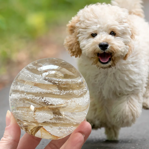 One-of-a-kind glass orb capturing your pet’s essence with cremation ash