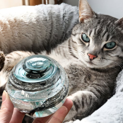 Custom glass pet memorial color-matched to your pet's fur and eyes. Glass memorial, Ashes in glass, pet memorial, custom color matched tribute, giveaway, free, glass orb, paperweight, tranquil swirl, infinity staircase double helix