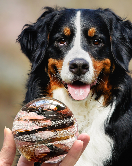 Handblown glass memorial orb with custom colors inspired by a beloved pet